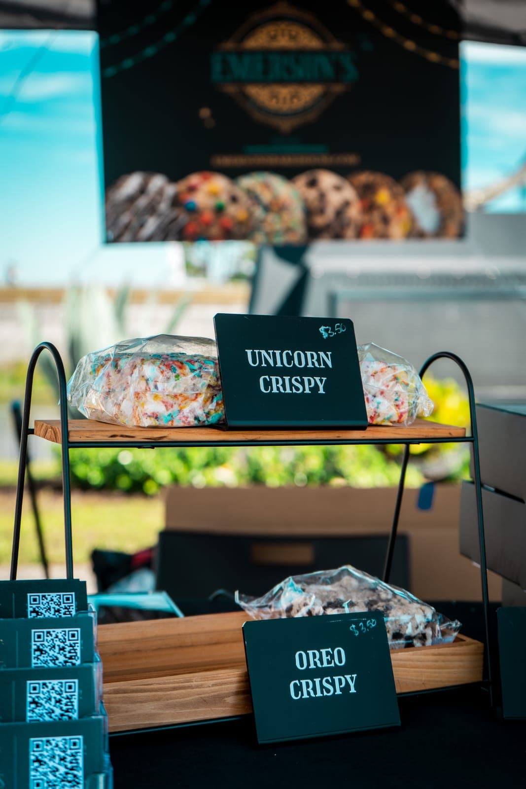 Unicorn Crispy and Oreo Crispy on a wooden display stand