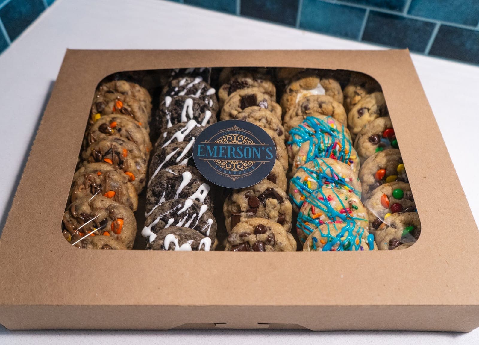 Overhead view of a boxed mini cookie party pack with assorted flavors