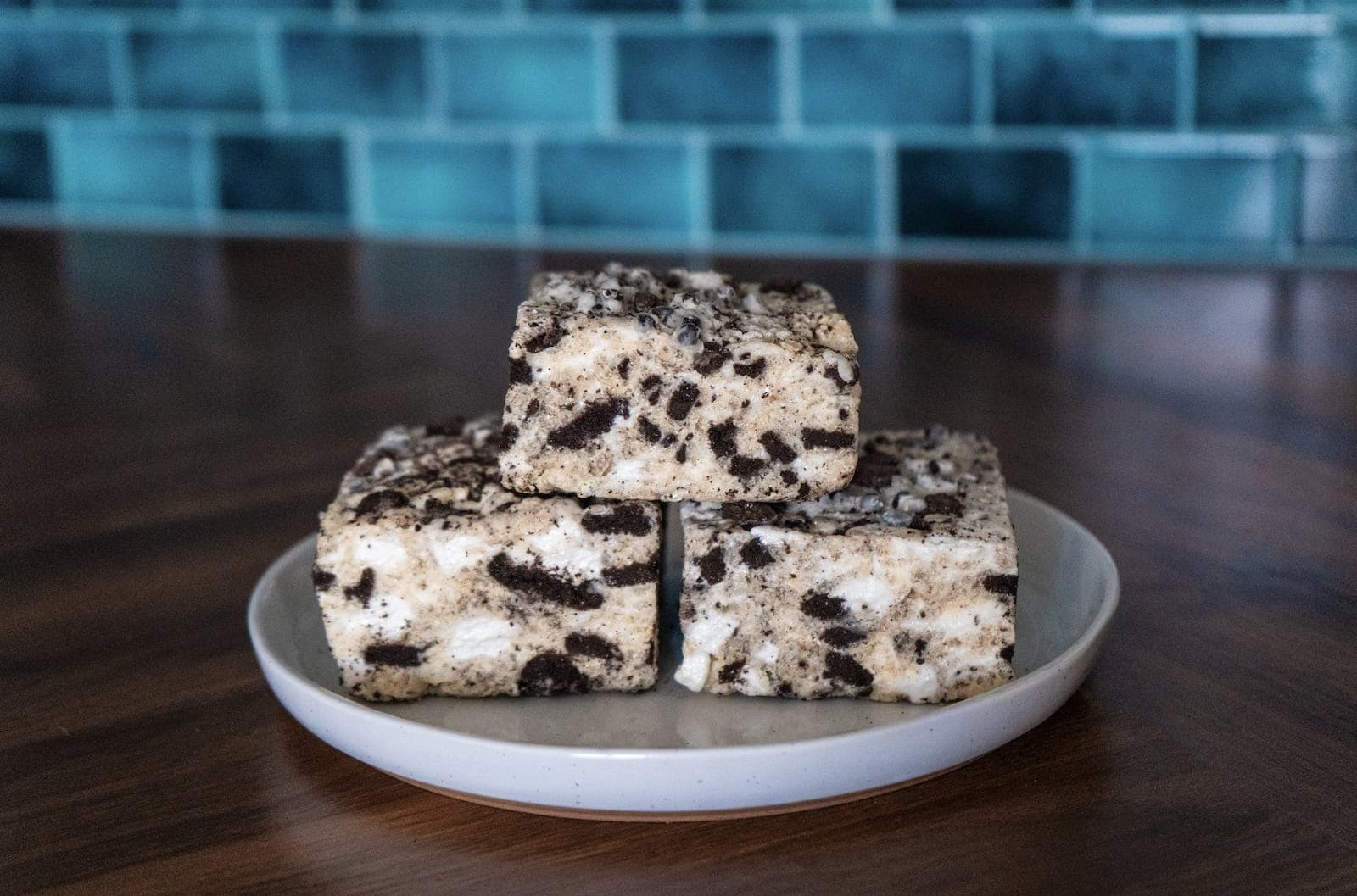 Oreo Crispies stacked on a white plate